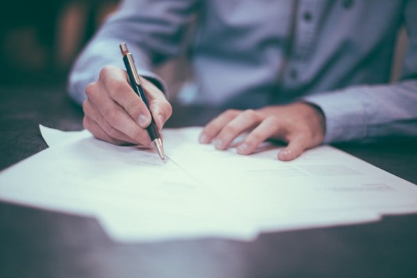 Business professional reviewing trade documents