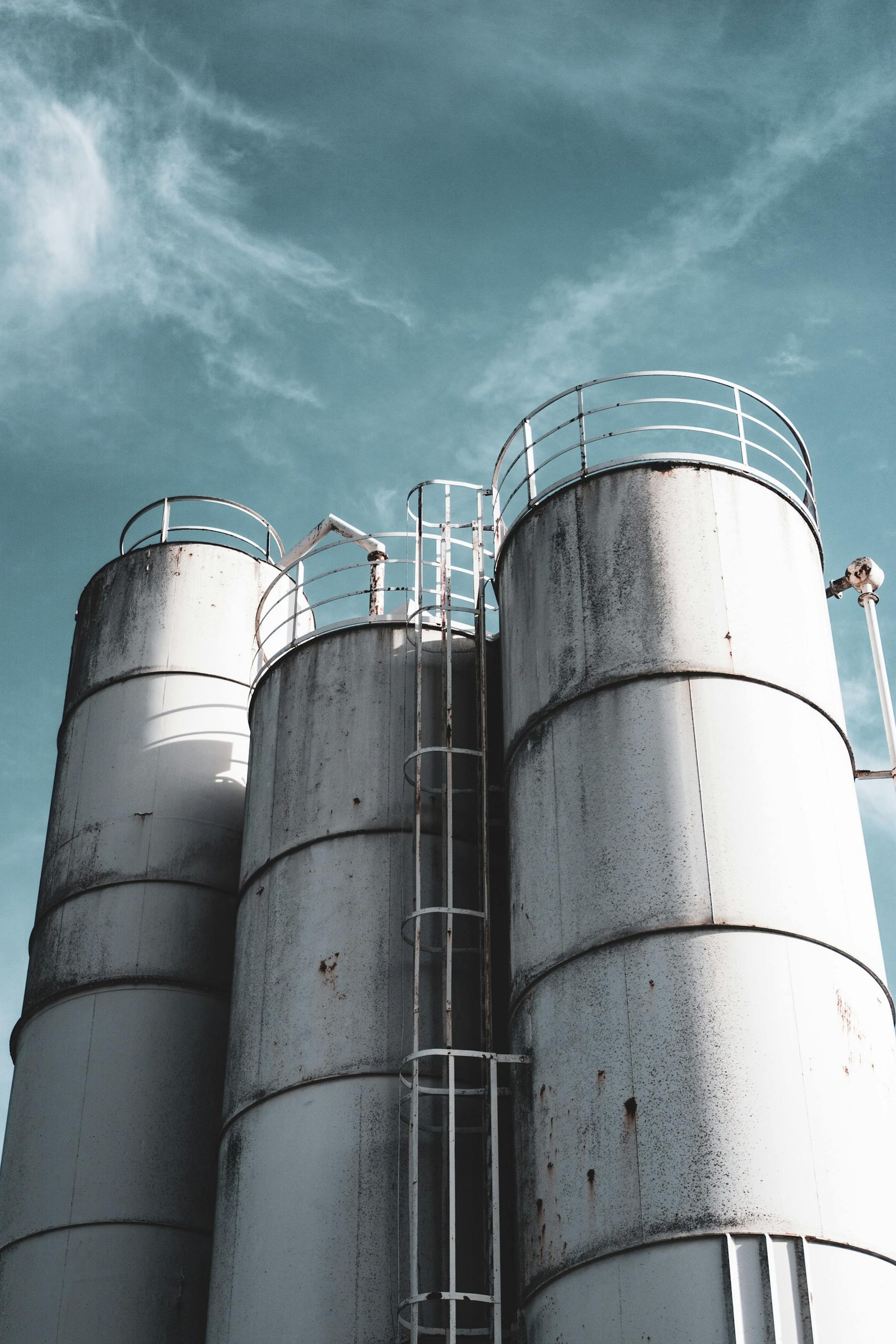 Industrial grain silos at sunrise